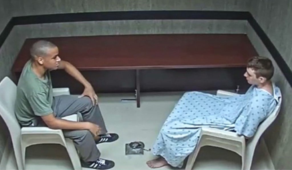 A scene from a police video of the interrogation of Parkland school shooting suspect Nikolas Cruz (right) with his brother Zachary, who police let into the room. Photo: Florida State Attorney's Office
