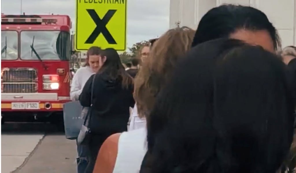People are evacuated outside Toronto’s Yorkdale Mall after reports of gunshots on Thursday, in this still image obtained from video from social media. Photo: Sudan Kendal / Reuters