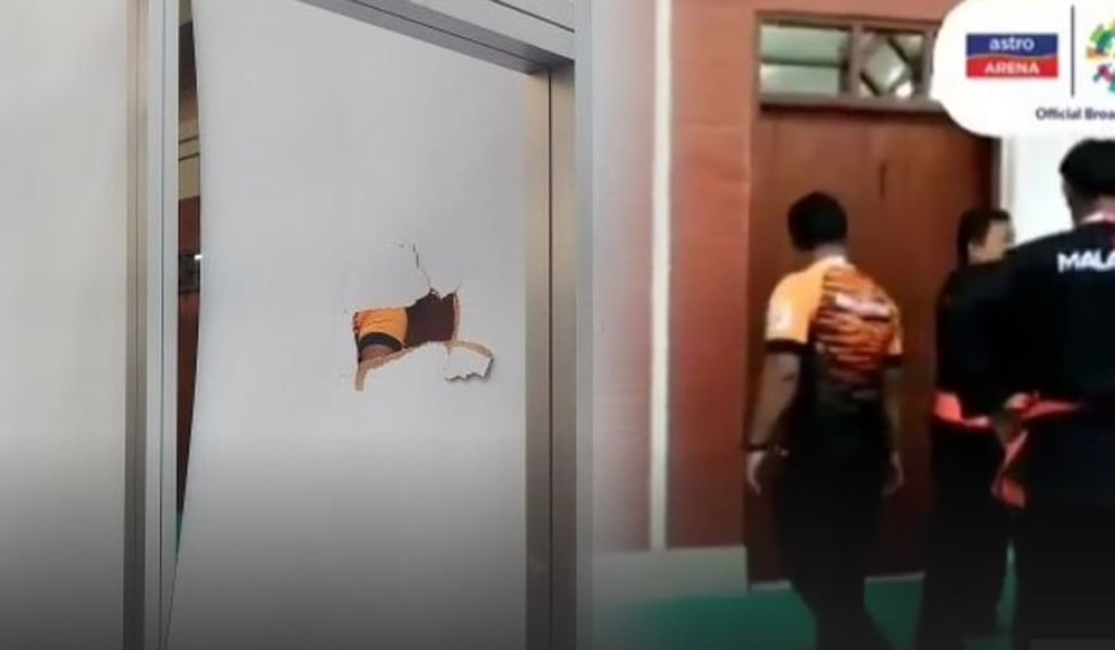 The hole in the partition after Mohd Al-Juffri punched it. Photo: Instagram The hole in the partition after Mohd Al-Juffri punched it. Photo: Instagram