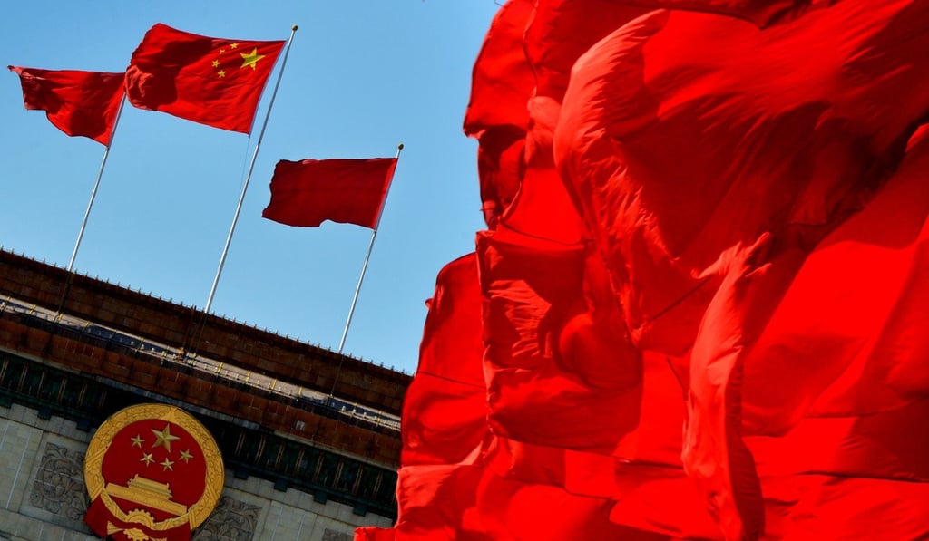 Chinese flags fly at the Great Hall of the People. Photo: AFP