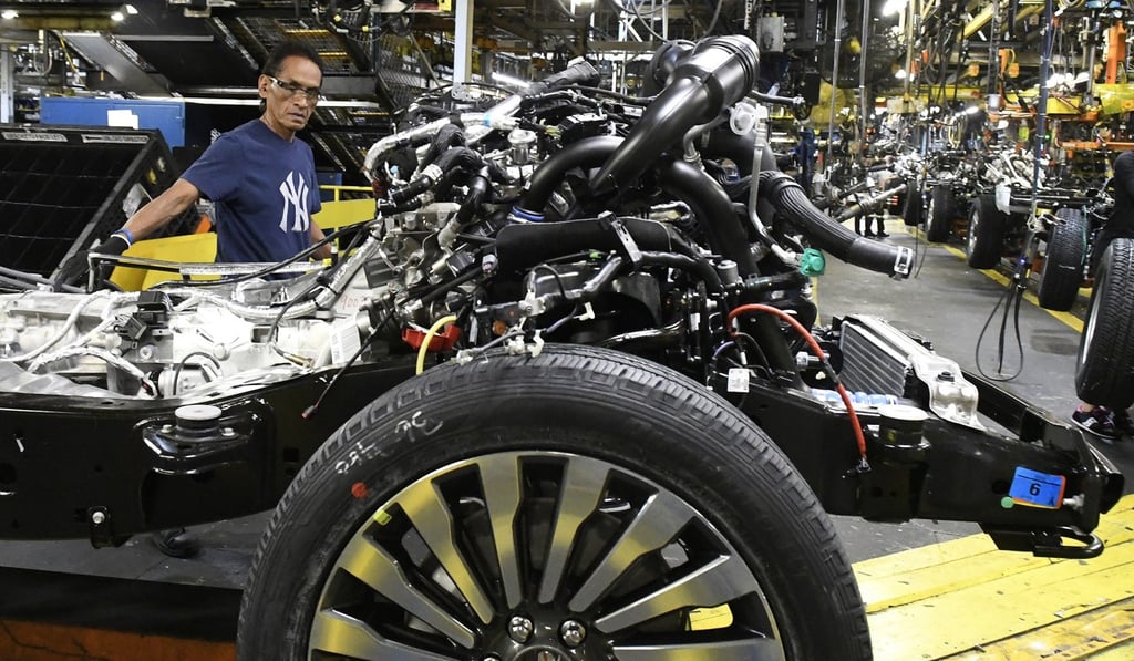 Workers assemble Ford trucks at a plant in Louisville, Kentucky last year. Photo: AP