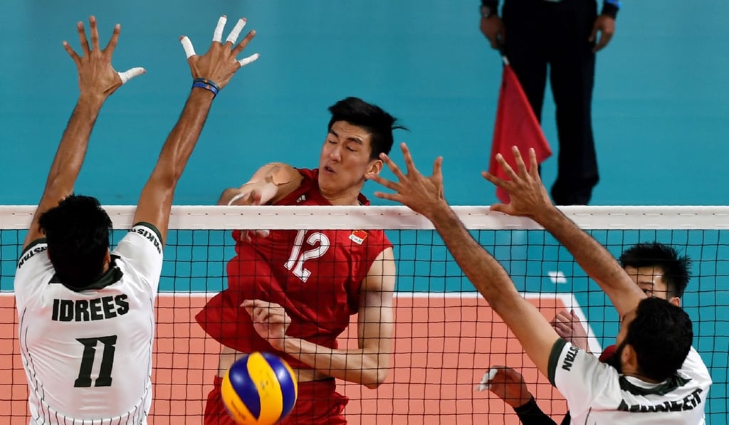 China’s Zhang Zhejia spikes against Pakistan. Photo: AFP