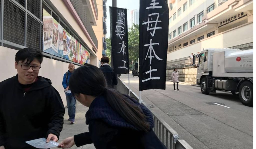 Studentlocalism activists distribute fliers on a street. Photo: Facebook