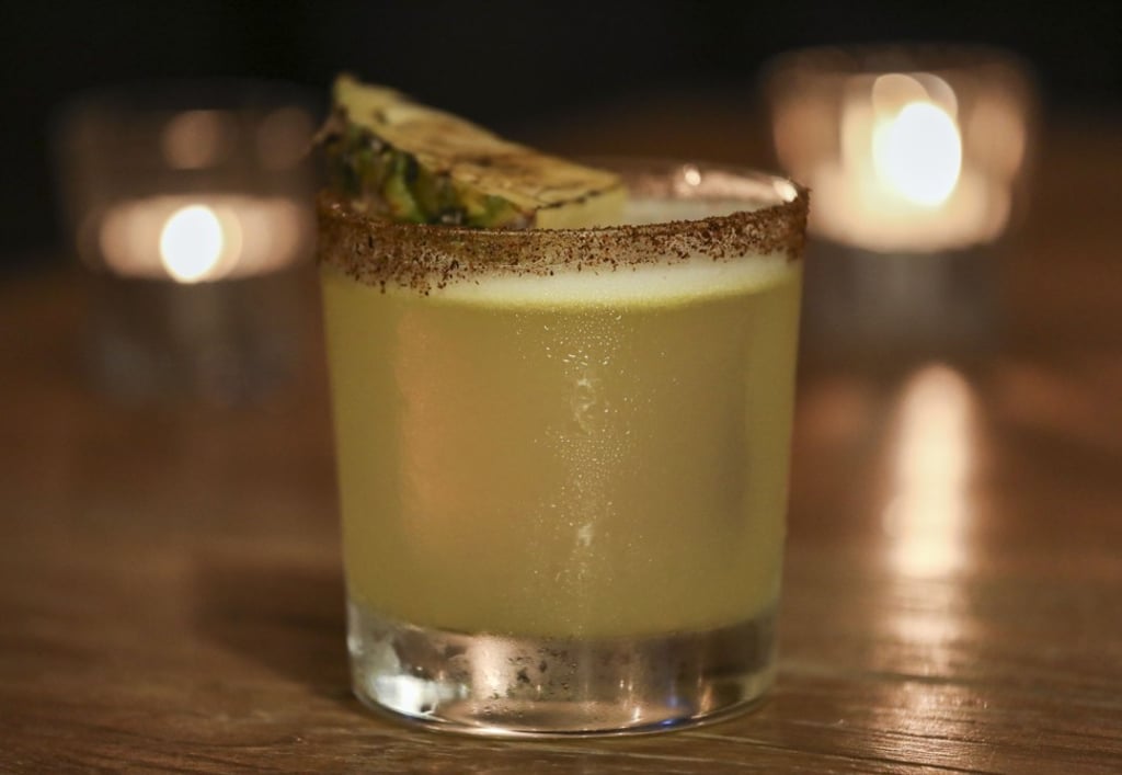 COA has several tongue-numbing cocktails on the menu, such as The Dancer. Photo: Tory Ho