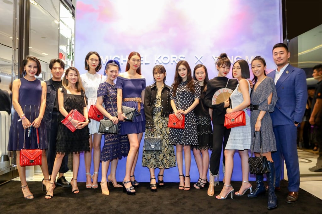 Chinese celebrities and influencers at an event to celebrate the Michael Kors x Yang Mi Whitney handbag collaboration. Chinese celebrities and influencers at an event to celebrate the Michael Kors x Yang Mi Whitney handbag collaboration.