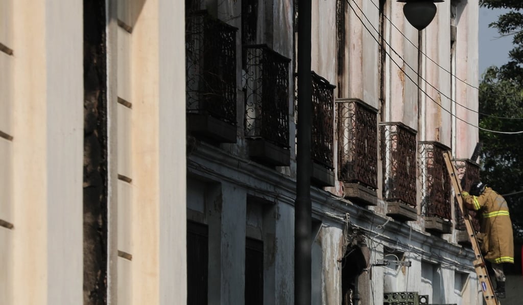 A firefighter at the museum on Monday. Photo: EPA