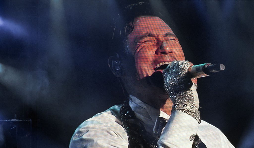 Police in the mainland Chinese city of Jinhua in Zhejiang province snared a fugitive from a concert crowd of 50,000 at a show by Jacky Cheung Hok-yau, one of the legendary ‘Four Heavenly Kings’ of Hong Kong entertainment. Photo: Xinhua