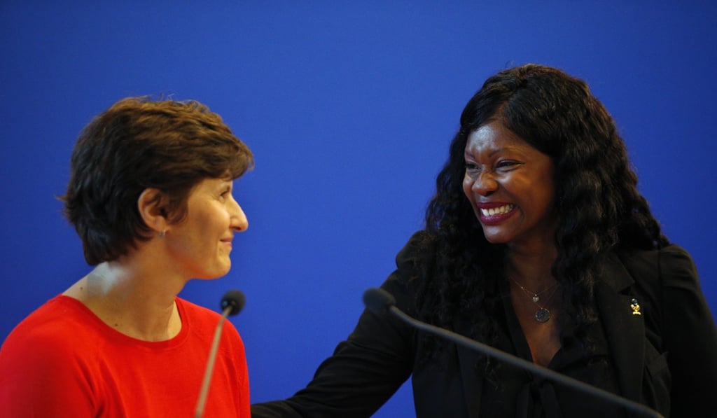 Newly appointed French Sports Minister Roxana Maracineanu, left, is greeted by outgoing French Sports Minister Laura Flessel during the handover ceremony at the Sports Ministry, in Paris. Photo: AP