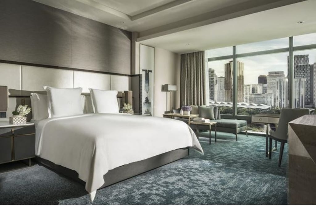 Enjoy the vista from a Park-view Room at the Four Seasons Hotel Kuala Lumpur.