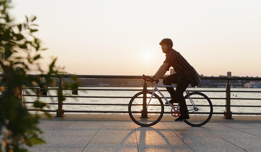 Gentle cycling is considered by the WHO as moderate-intensity exercise, of which adults should be getting at least 150 minutes a week. Photo: Alamy