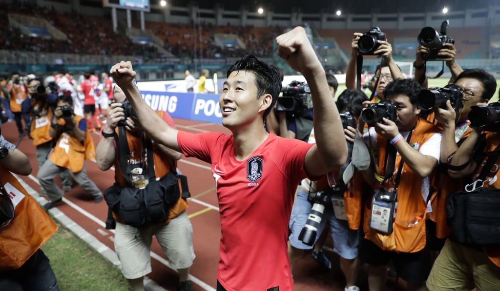 South Korea's Son Heung-min celebrates his country’s gold medal in Indonesia. Photo: EPA