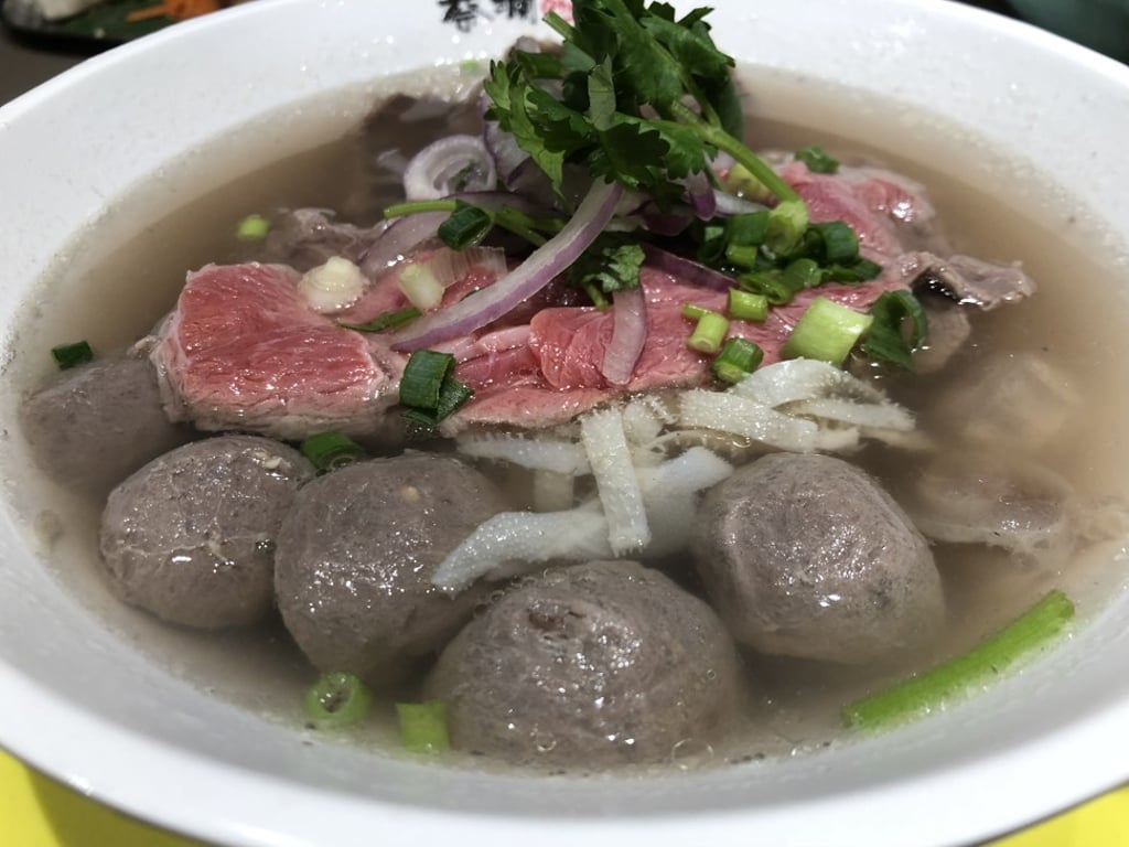 The special beef pho features seven beef cuts, including slim raw beef, beef brisket, tendons and coin-like beef pizzle.