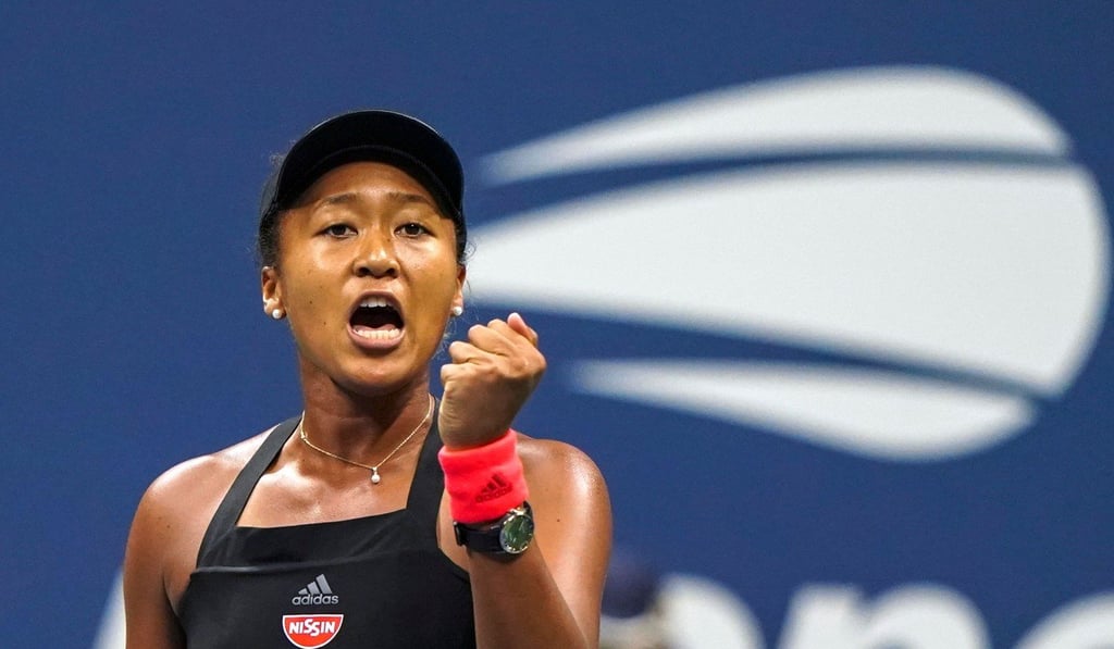 Japan’s Naomi Osaka celebrates winning a point against Madison Keys. Photo: AFP