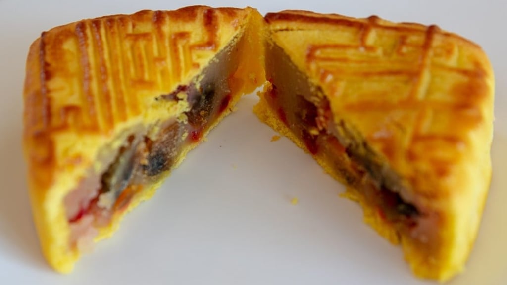 Preserved eggs and pickled ginger mooncakes served at Lung King Heen restaurant at the Four Seasons Hotel Hong Kong. Preserved eggs and pickled ginger mooncakes served at Lung King Heen restaurant at the Four Seasons Hotel Hong Kong.