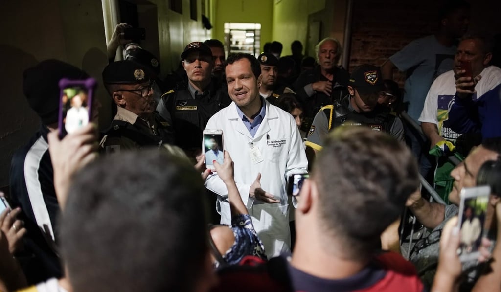 Surgeon Luiz Henrique Borsato speaking after performing surgery on presidential candidate Jair Bolsonaro. Photo: AP