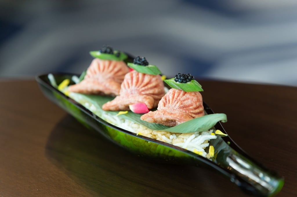 Deep fried crystal blue shrimp dumplings with caviar. Deep fried crystal blue shrimp dumplings with caviar.
