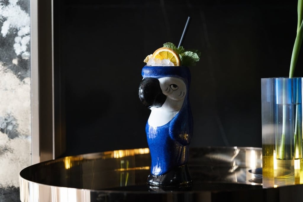 Try a Blue Macaw cocktail at the rooftop bar, a tropical fruit cocktail with a base of Pontelobos mescal.