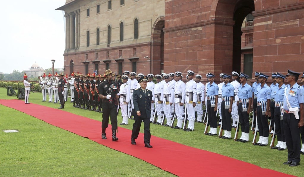 Chinese Defence Minister Wei Fenghe inspects a guard of honour during a ceremonial reception in New Delhi. Photo: AP Chinese Defence Minister Wei Fenghe inspects a guard of honour during a ceremonial reception in New Delhi. Photo: AP