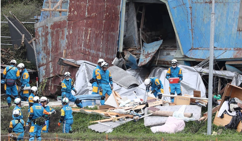 Rescuers search for missing people in Astuma on September 8, 2018. Photo: AFP