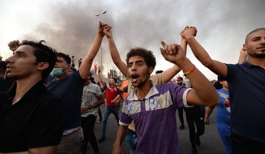 Protesters chant slogans in Basra. Photo: EPA
