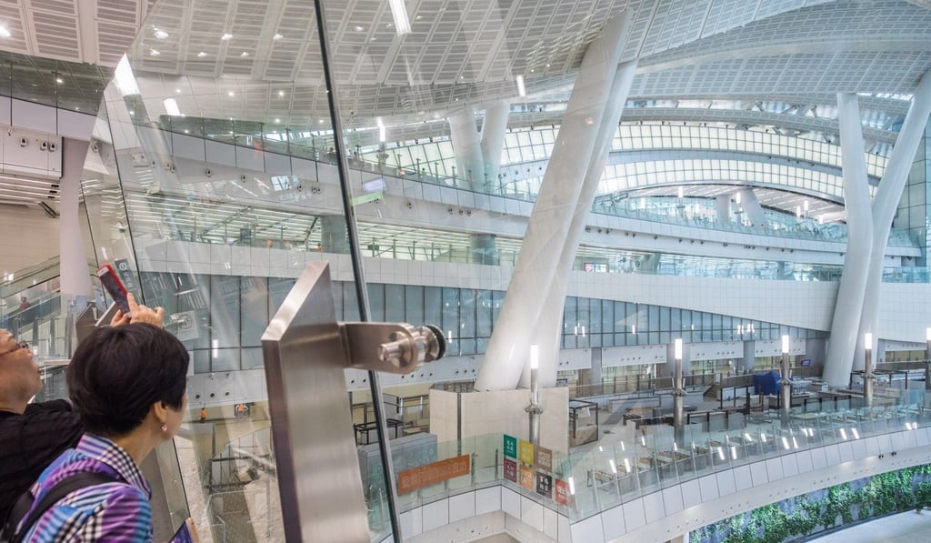 Visitors gawk at the new terminus at an open-day event. Photo: Paul Yeung/Bloomberg