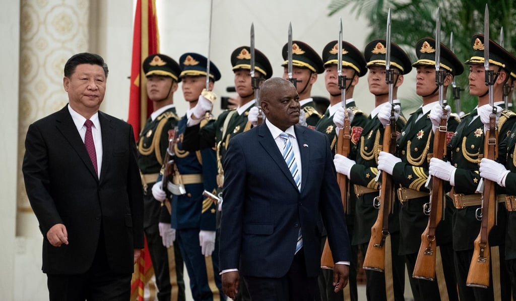 Xi and Masisi reviewing the honour guard in Beijing last month. Photo: Reuters