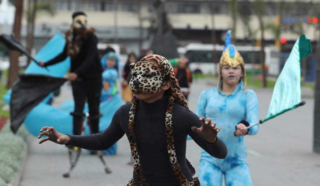 Activists gather to urge world leaders to take action against climate change in Lima, Peru, on Saturday. Photo: Reuters