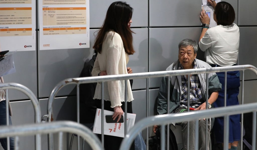 Leung Shing (second from left) was the first non-media person in line. Photo: Nora Tam