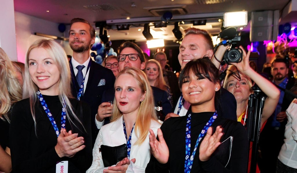 Supporters of the Sweden Democrats party watching results on Sunday. Photo: Reuters