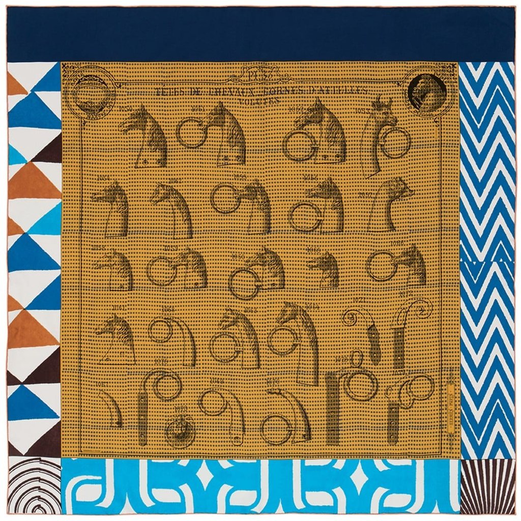 The silk Manufacture de Boucleries Détail 90 scarf, featuring a collection of saddlery prints and assorted geometric motifs.