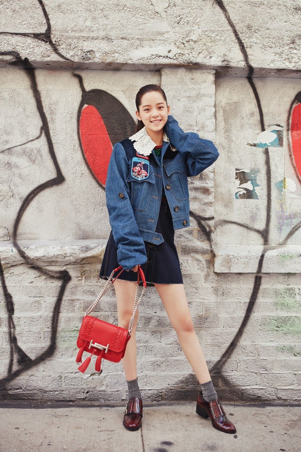 Ouyang Nana sporting a Tod’s bag. The young musician says High School Musical made a huge impression on her.