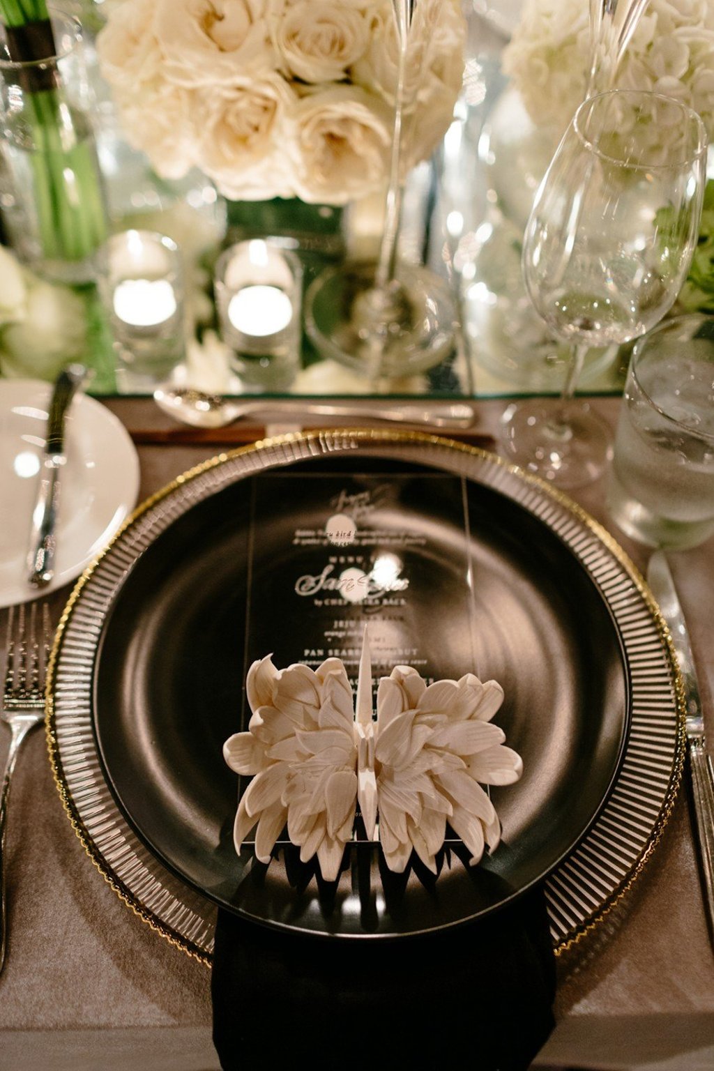 Personalised plate settings are just one luxurious detail of a high-profile wedding.