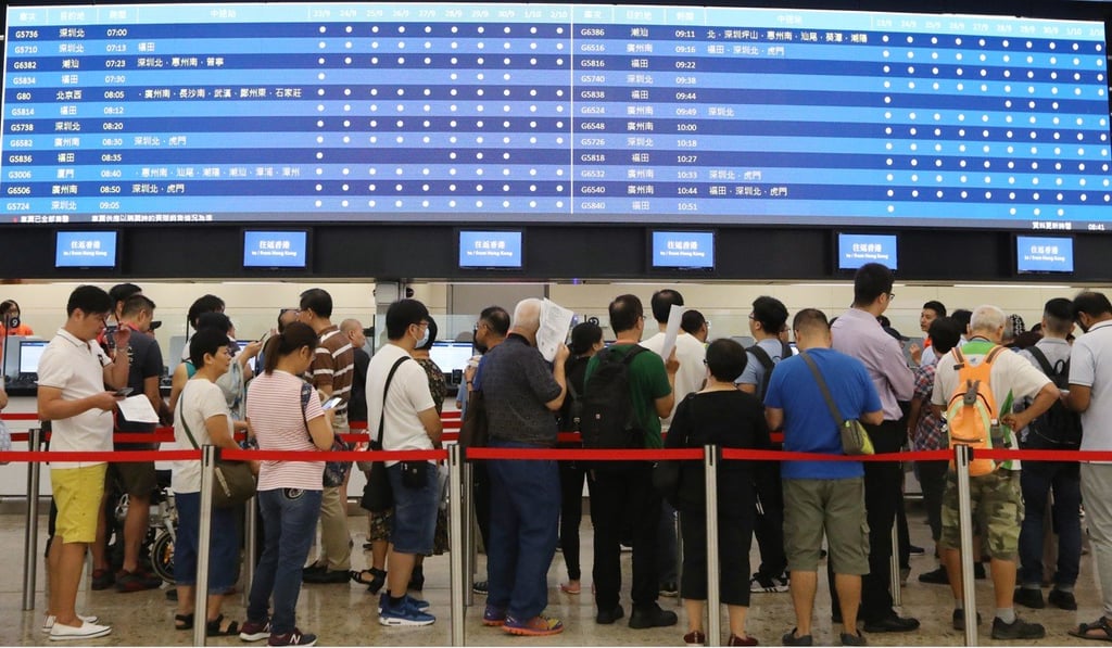 Passengers lining up to buy advance tickets at the West Kowloon terminus. Photo: Nora Tam