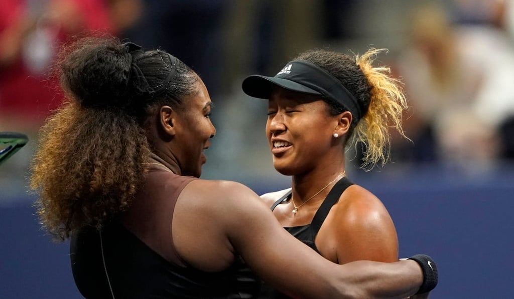 Naomi Osaka and Serena Williams meet at the net after their 2018 US Open women's singles final match. Photo: AFP
