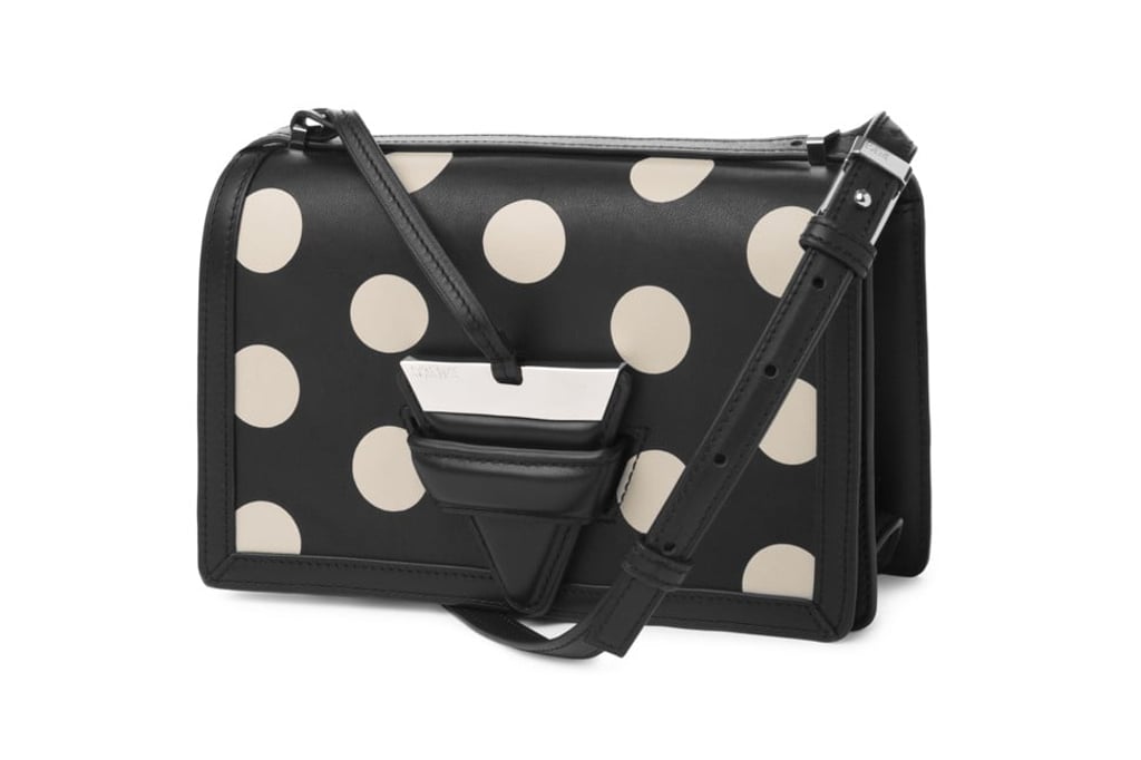 Loewe. The playful black leather bag features white Barcelona polka dots and hardware in palladium, HK$23,550