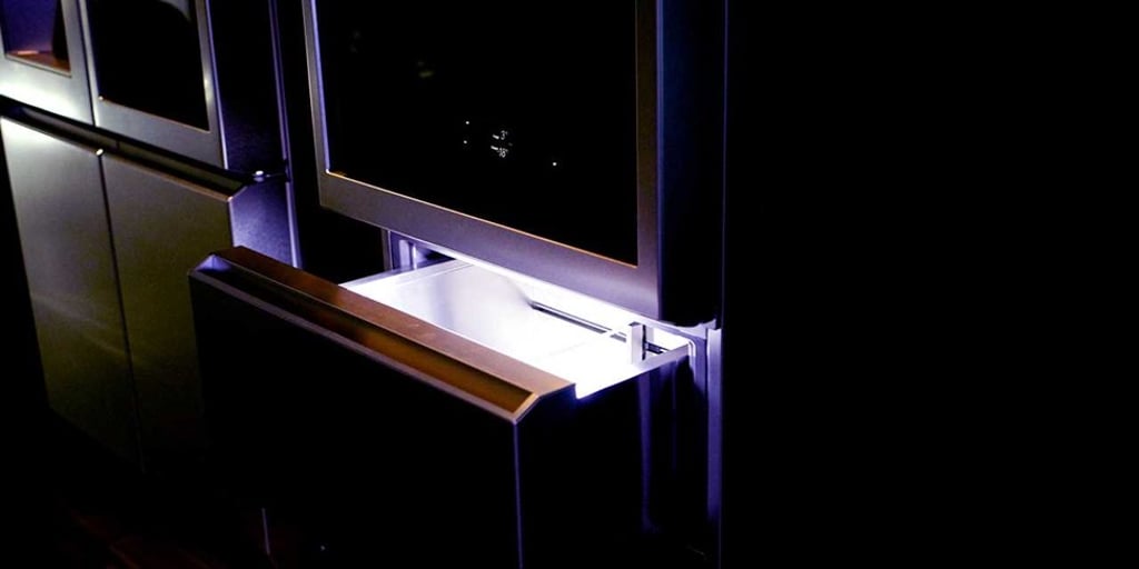 The LG Signature bottom-mounted freezer refrigerator raises the drawer to eye level for users. The LG Signature bottom-mounted freezer refrigerator raises the drawer to eye level for users.