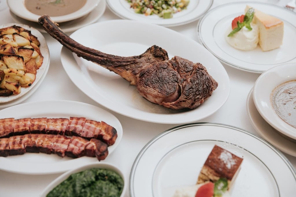 Dishes from ‘A Night With Peter Zweiner’ at Wolfgang’s Steakhouse, including the famous 1200g Tomahawk steak. Dishes from ‘A Night With Peter Zweiner’ at Wolfgang’s Steakhouse, including the famous 1200g Tomahawk steak.