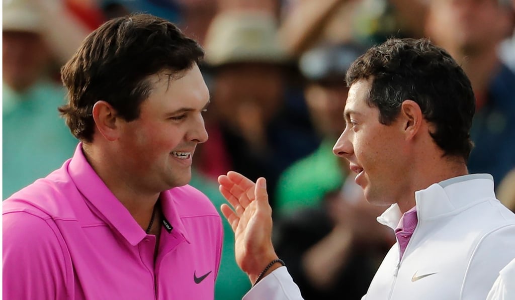Patrick Reed (left) and Rory McIlroy. Photo: AP