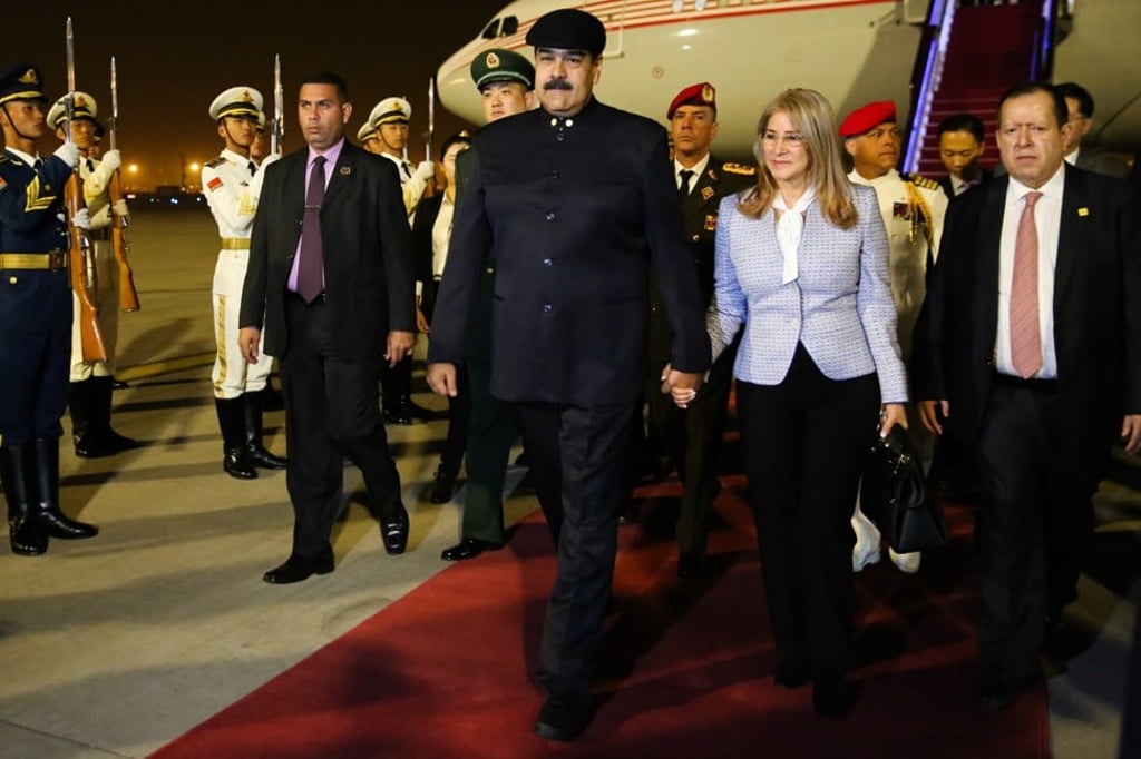 Venezuelan President Nicolas Maduro (centre) and his wife, Cilia Flores, arrive in Beijing. The leader was in Beijing mainly seeking economic cooperation. Photo: EPA-EFE