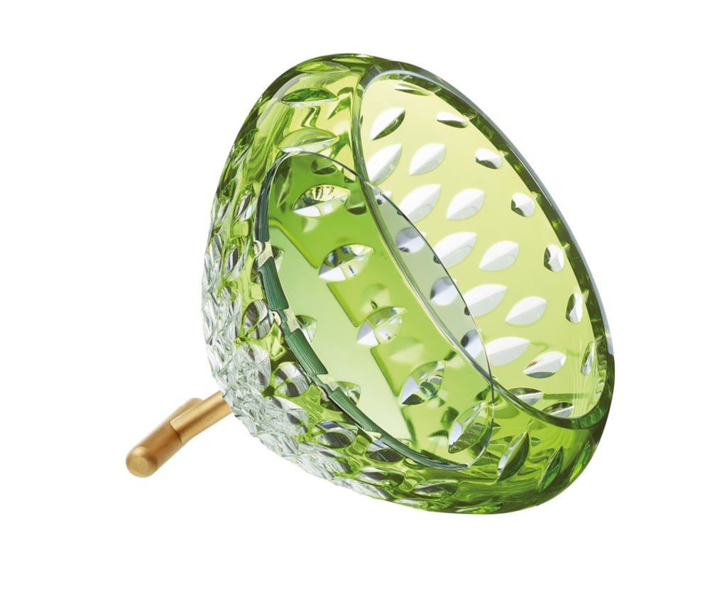 Saint Louis. The Folia mirror in chartreuse green is limited to 188 pieces. Inspired by forests, the mirror is crafted with double-layered clear crystal and brushed brass, HK$11,950