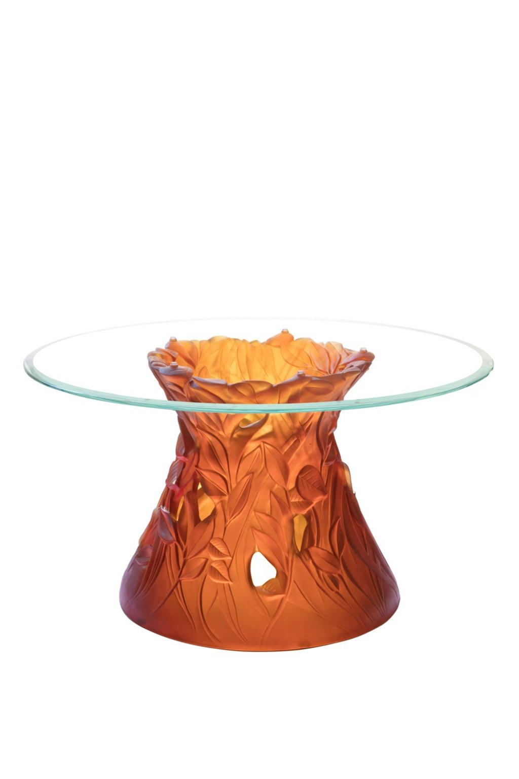 Daum. The Végétale Amber Coffee Table pays homage to nature. The table has an amber-coloured satin base in the form of a tree trunk, and is translucent under lighting, HK$344,500