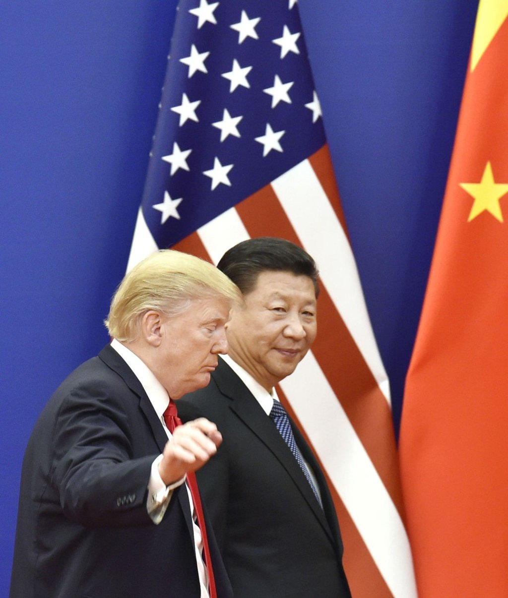 US President Donald Trump (left) and Chinese President Xi Jinping leave the Great Hall of the People in Beijing in November 2017. Photo: Kyodo