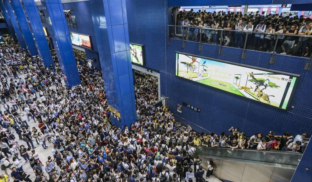 The commuter crush at Tai Wai MTR Station amid longer intervals between trains on the East Rail Line early on September 17, the day after Typhoon Mangkhut hit Hong Kong. Photo: Felix Wong