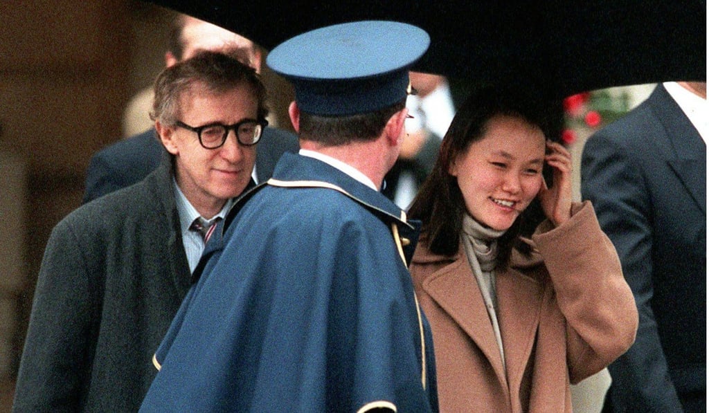 Newlyweds Woody Allen and Soon-Yi Previn leave the Ritz hotel in Paris on December 25, 1997. Photo: AP