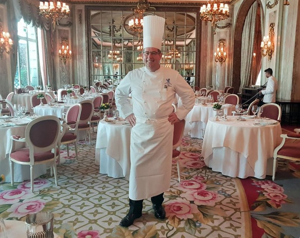 John Williams, in the dining room at the Ritz, has just published the hotel’s first cookbook. Photo: Richard Vines/Bloomberg