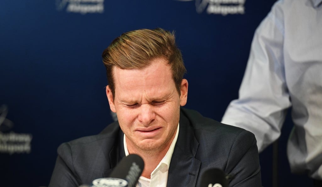 Steve Smith breaks down during a press conference after the scandal broke. Photo: EPA