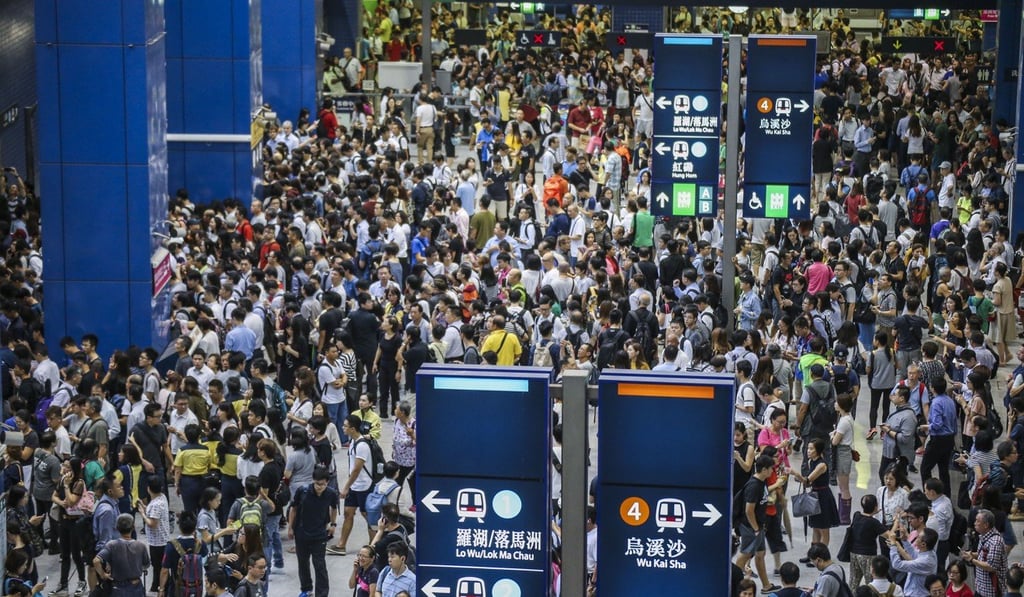 Crowds of people try to get to work on Monday morning after Hong Kong recovers from Typhoon Mangkhut. Photo: Felix Wong