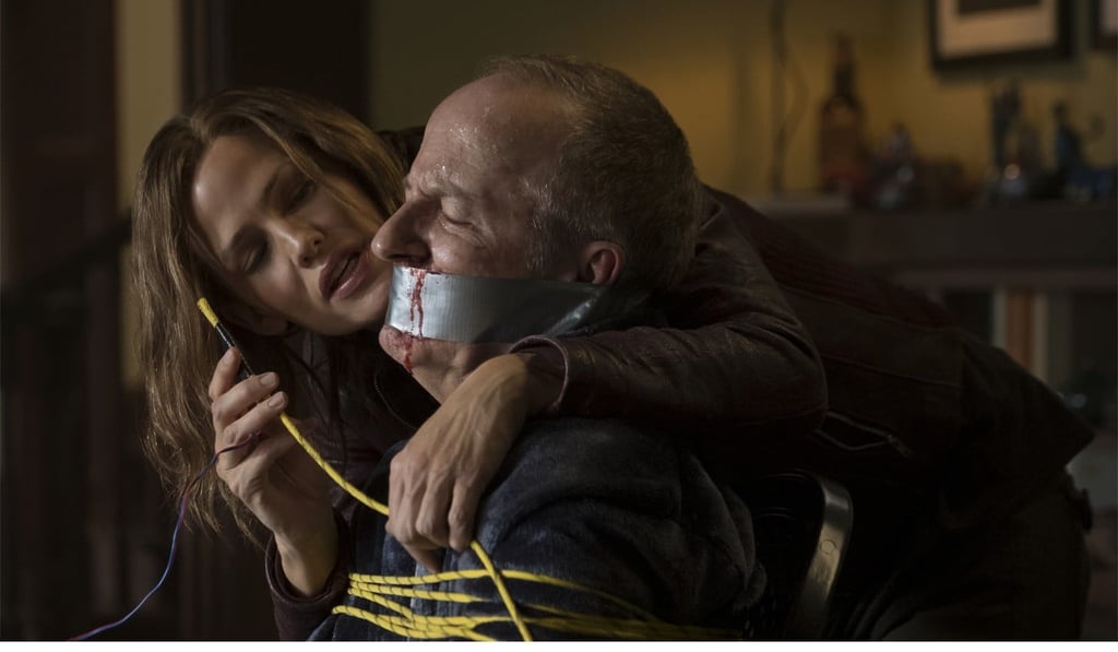 Garner and Jeff Harlan in a still from Peppermint. Garner and Jeff Harlan in a still from Peppermint.