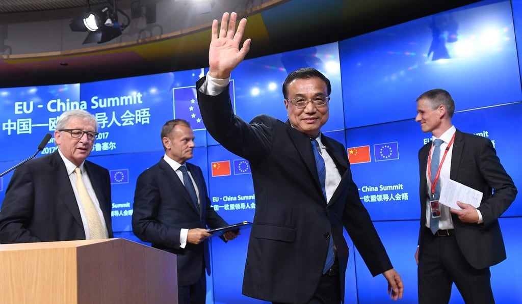 Chinese Premier Li Keqiang waves as he and European Commission President Jean-Claude Juncker (left) and European Council President Donald Tusk (second from left) leave a press conference at the end of an EU-China summit at the European Council in Brussels in June 2017. The EU and China agreed to increase cooperation to fight climate change after President Donald Trump pulled the US out of the Paris climate deal last summer. Photo: AFP