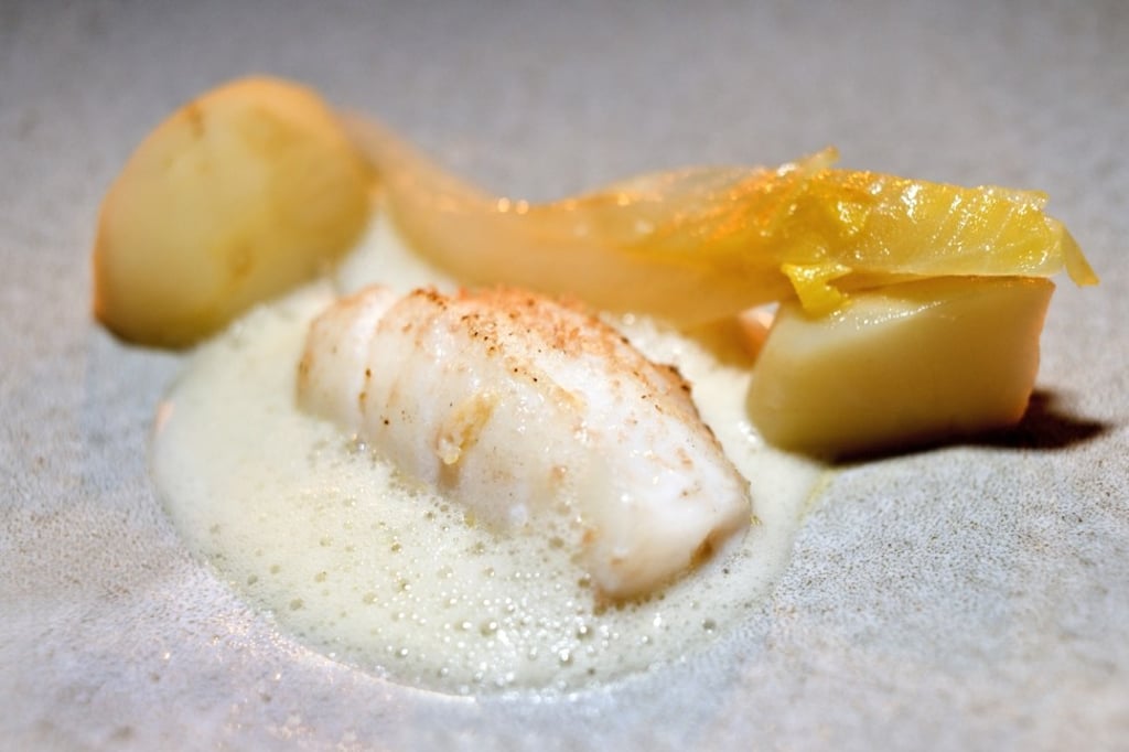 Juniper smoked cod from Ekstedt. Celebrity chef Niklas Ekstedt serves dishes cooked exclusively using fire in a wood-fired oven or over a wood-fired stove. The chef has intentionally kept his flavours rustic.